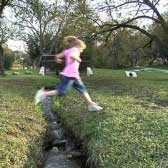 Child taking a running leap