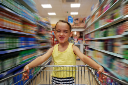 boy on shopping cart