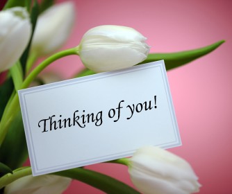 "Thinking of You!" note and flowers