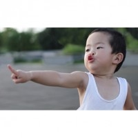Asian toddler pointing
