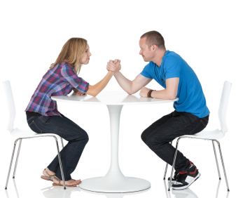 Resolving disagreements - man and woman arm wrestling