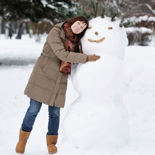 Woman Hugging Snowman Mother