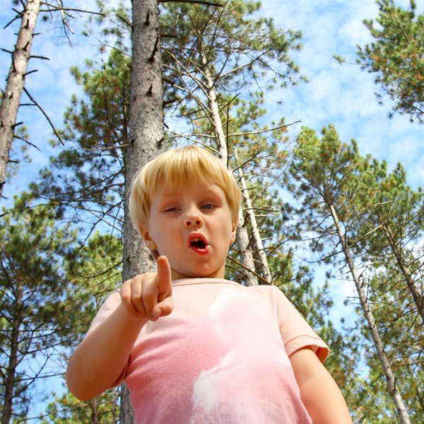 Child Spotting Danger in the Woods